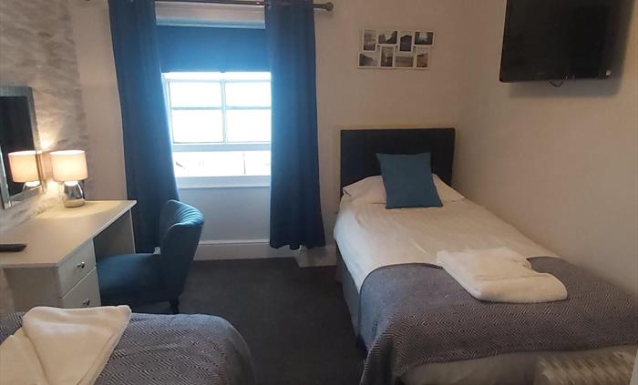 Family Room - 3rd floor - Double and twin room, shared shower room.